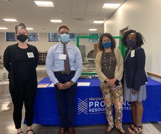 From left to right, volunteer Hanna Sheehan, 2021 Academy Fellow Cameron Williams, 2020 Academy Fellow Nancy Hudes, and volunteer Manuelletta Dominique serve at a community-based estate planning clinic.